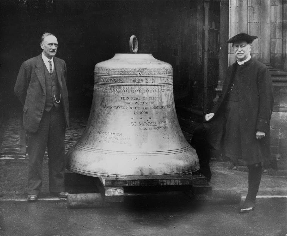 The new tenor bell in 1928. Joseph Smith Clerk of Works (left) Dean William Moore-Ede (right)